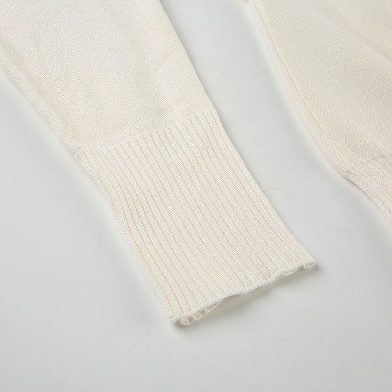 Pull asymétrique à épaule dénudée