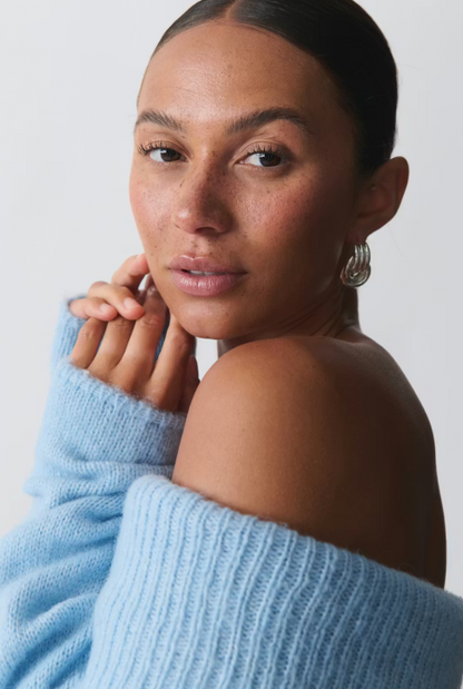 Pull à épaule dénudée