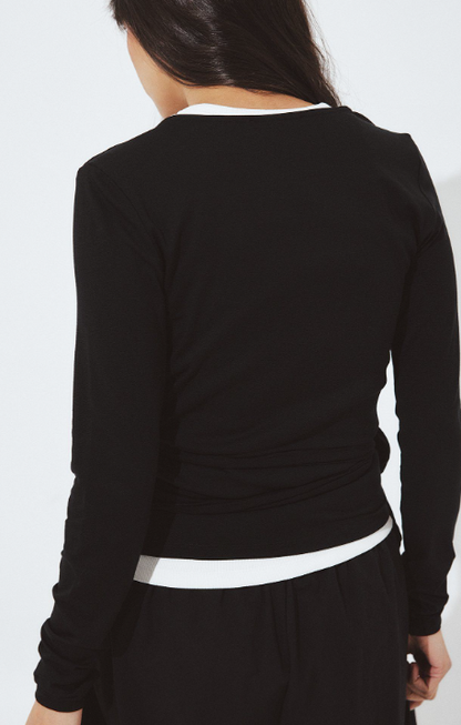 Top cache-coeur en maille