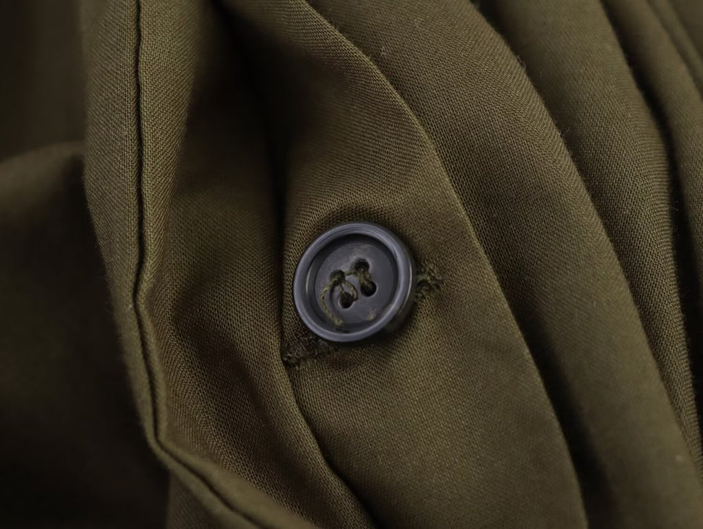 Robe midi plissée à col en V