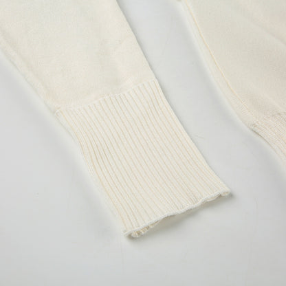 Pull asymétrique à épaule dénudée