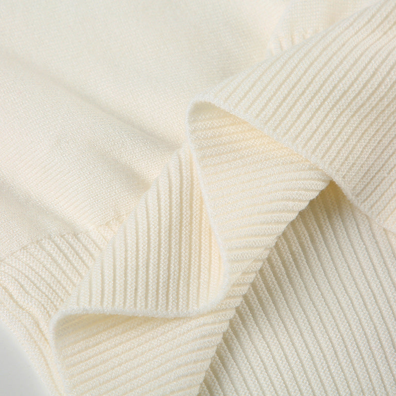 Pull asymétrique à épaule dénudée