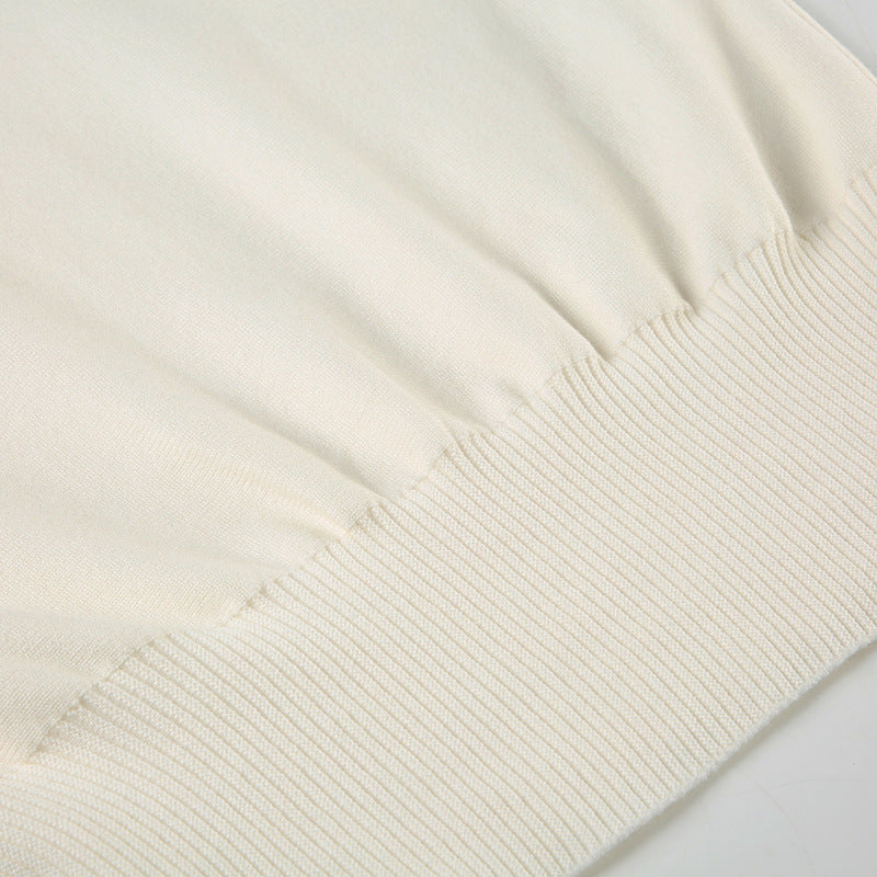 Pull asymétrique à épaule dénudée