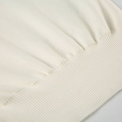 Pull asymétrique à épaule dénudée